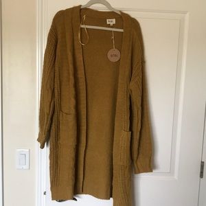 NWT from Glamour Farms Boutique long cable knit cardigan. mustard yellow color
